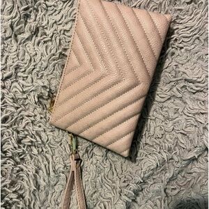 A wallet/small purse! Clean and looks brand new, never used!